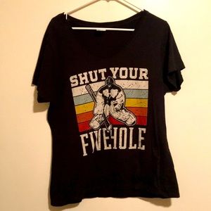 Woman’s black shirt sleeve hockey “shut your five hole” tee shirt